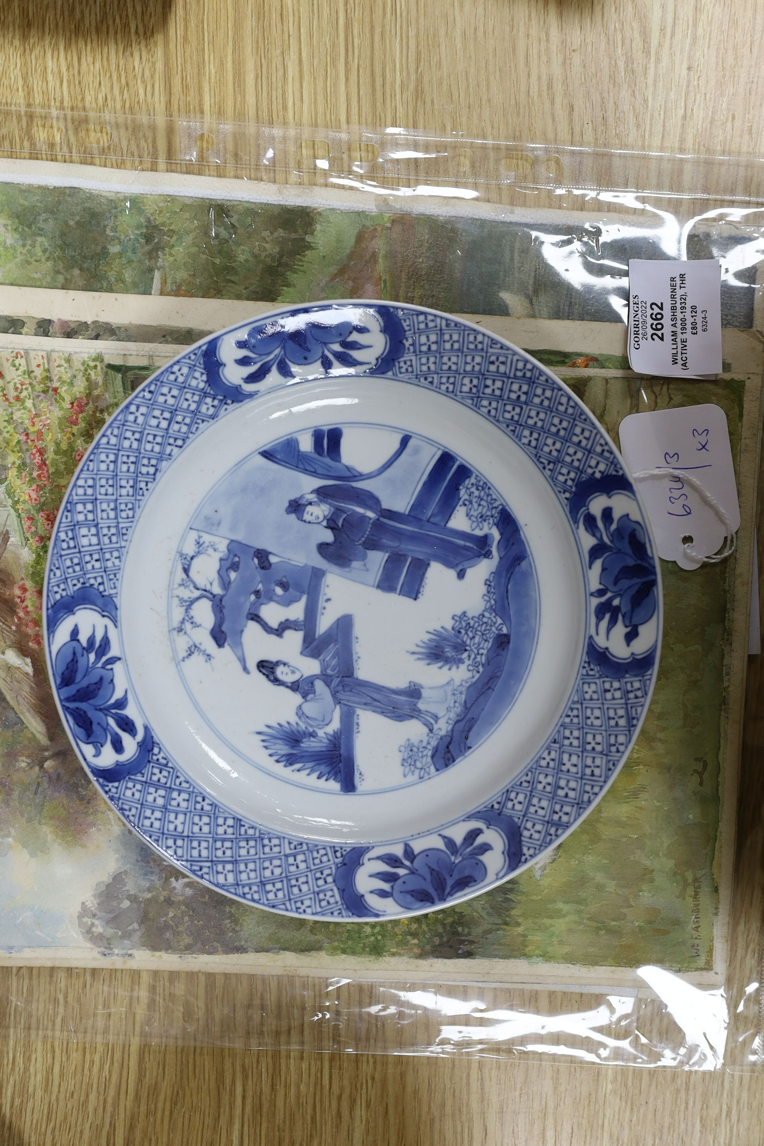 Two Chinese blue and white plates, Kangxi period, one with Kangxi mark the other a Chenghua mark, 21 cms diameter